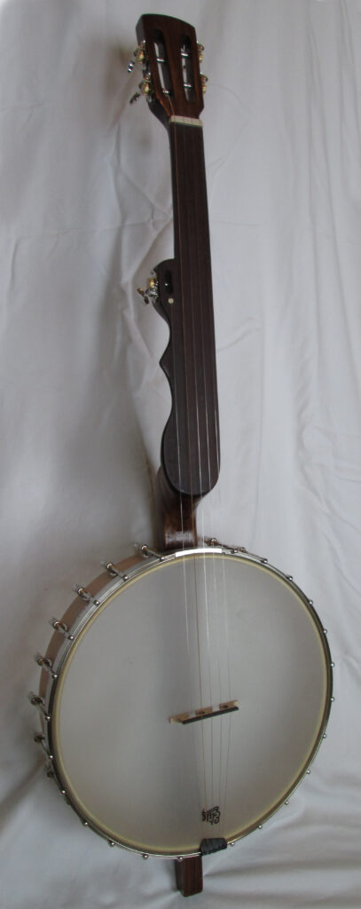 The front and side view of a five string banjo